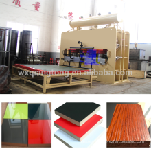 Wuxi Qiangtong courbe automatique à faible cycle mélamine MDF stratifié ligne de pressage à chaud